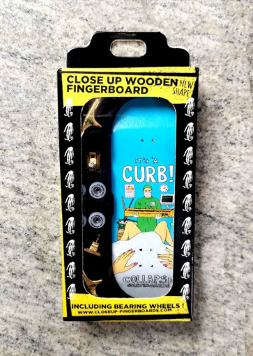 CLOSE UP FINGERBOARD ITS A CURB